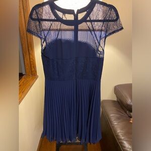 Navy Blue dress in very good condition. Worn once. Formal wear.